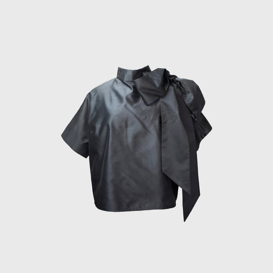 Black blouse on a light gray background